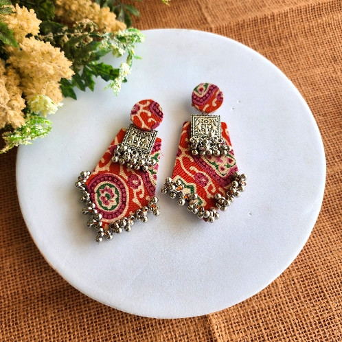 Orange Printed Floral Trishul Charm Earrings